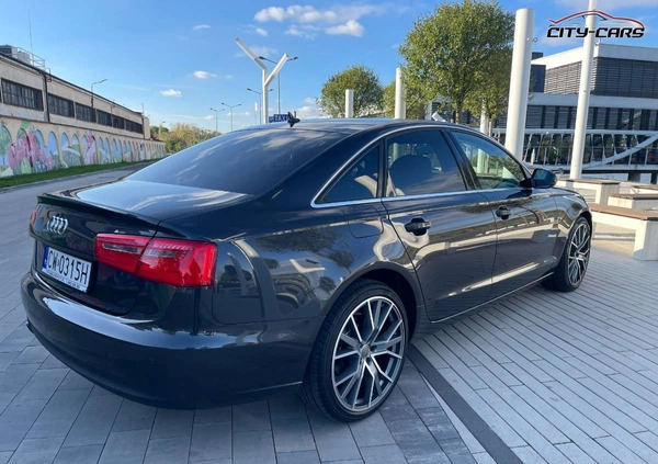 Audi A6 cena 77600 przebieg: 215000, rok produkcji 2014 z Sejny małe 529